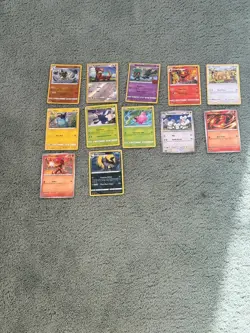 12 pokemon cards used in a match 1 time and they are one year - Image 1