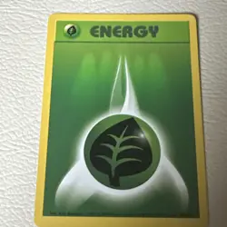 Grass Energy 99/102 Base Set Pokemon Card - Image 1