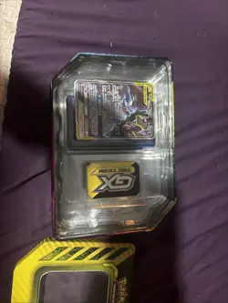 Opened Pokemon TCG Tag Team GX Tin with Card - Image 1