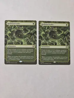 2x Hardened Scales - WoE Enchanting Tales - Near Mint - MTG - Image 1