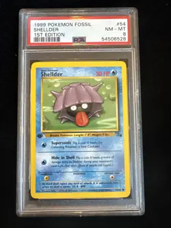 Shellder 54/62 Fossil Regular 1st Edition PSA 8 Pokemon - Image 1