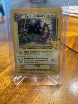 Light Toxtricity SWSH137 Black Star Promos Stamped Celebrations Holo Pokemon - Image 1