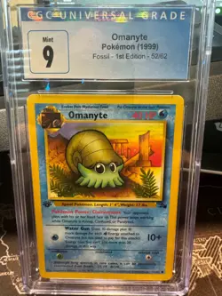 1999 Pokemon Fossil 1st Edition Omanyte 52/62 CGC 9 Mint Graded - Image 1