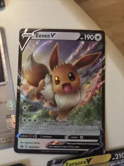 Pokemon TCG Eevee v SWSH065 Ultra Rare Card NM/M Condition - Image 1