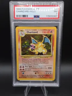 1999 POKEMON BASE SET UNLIMITED #4 CHARIZARD-HOLO PSA 7 - Image 1