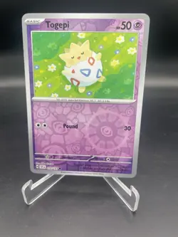 Pokemon TCG * SV Surging Sparks * 070/191 Togepi Common REVERSE HOLO Plus Bundle - Image 1