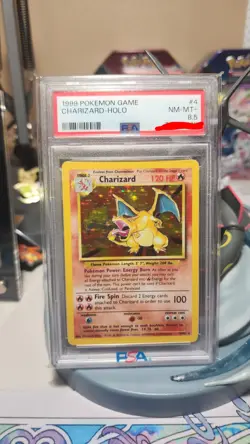 1999 POKEMON BASE SET UNLIMITED #4 CHARIZARD-HOLO PSA 8.5 - Image 1