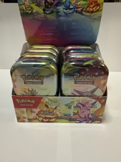 Prismatic Evolutions Pokemon TCG Tin (Random) - Factory Sealed - 2 Booster Packs - Image 1