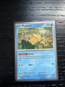 Psyduck Cosmos Holo Promo Pokemon Card MEP 007 - Image 1