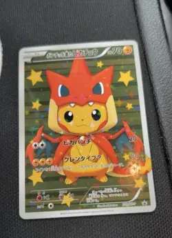 2016 Pokemon JPN XY Promo Poncho Wearing Pikachu M Charizard Y #208 Not Graded - Image 2
