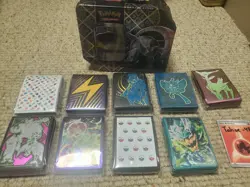 Pokemon Card Sleeve Lot featuring MEW, SSP, & more + EMPTY iron treads tin - Image 1