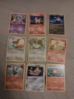 9 pokemon cards lot- solrock, jirachi, pancham, charmander, fletchling, eevee - Image 1