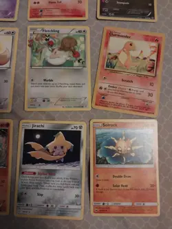 9 pokemon cards lot- solrock, jirachi, pancham, charmander, fletchling, eevee - Image 3