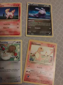 9 pokemon cards lot- solrock, jirachi, pancham, charmander, fletchling, eevee - Image 4