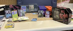 Pokemon Card Lot - Trainer Boxes, Tins, And Random Cool Cards - Image 1