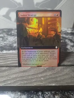 MTG Fallout - Stolen Strategy - Foil Extended Art Rare R 0467 - Image 1