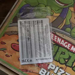 NYCC 2025 - MTG X TEENAGE MUTANT NINJA TURTLES PIZZA BOX WITH PROMO - Image 3