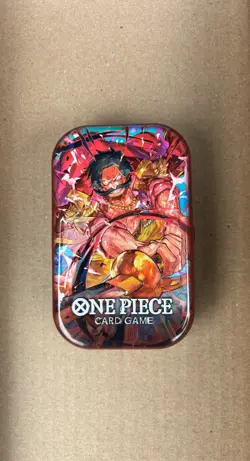 2 Pokemon tine filled with Pokemon cards! & a free Once Piece tin w/ OP cards - Image 2