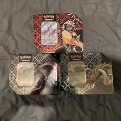 Pokemon TCG Paldean Fates 3x Large Tins Great Tusk Iron Treads Charizard Sealed! - Image 1