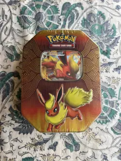 Pokemon Elemental Power Flareon GX Tin- Sealed - Small Tear - Image 1