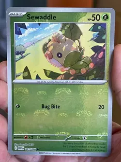 POKEMON SEWADDLE 001/086 COMMON MASTER BALL WHITE FLARE REVERSE HOLOFOIL NM CARD - Image 1