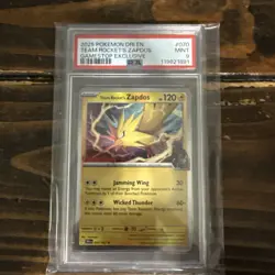 2025 POKEMON DESTINED RIVALS GAMESTOP EXCLUSIVE #070 TEAM ROCKET'S ZAPDOS PSA 9 - Image 1