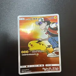 JAPANESE POKEMON PROMO CARD - RED'S (ASH'S) PIKACHU 270/SM-P (2018) - Image 2