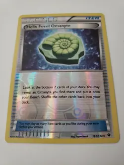 Helix Fossil Omanyte 102/124 NM/M Uncommon Reverse Holo Pokemon Fates Collide - Image 1