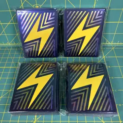 4x Pokemon TCG Deck Sleeves 65ct Surging Sparks Pikachu Bolt Card Sleeves Gold - Image 1