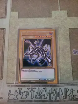 YUGIOH RED-EYES BLACK DRAGON MAGO-EN003 GOLD 1ST EDITION NM - Image 1