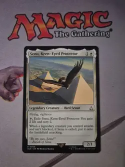 MTG Senu, Keen-Eyed Protector [Assassin's Creed, Near Mint] - Image 1