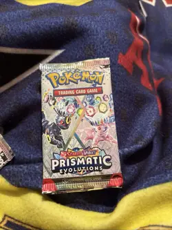 Pokemon Prismatic Evolutions Single Booster Pack - Image 1