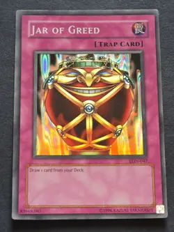 Jar of Greed LON-047 Yu-Gi-Oh! trading card. - Image 1