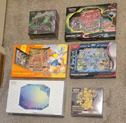 Pokemon Sealed Lot - Terapagos EX Ultra Premium, Reshiram Charizard GX Premium + - Image 1