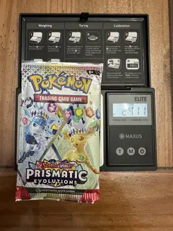 Pokemon Prismatic Evolutions Booster Pack -HEAVY 24.11g- Possible Demi/God Pack! - Image 1