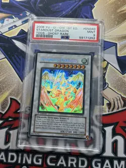 Yugioh PSA 9 Stardust Dragon TDGS-EN040 1st Edition Ghost Rare - Image 1