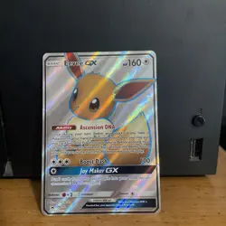 Pokemon TCG Eevee GX Full Art Rare Black Star Promo Card SM242 LP - Image 1