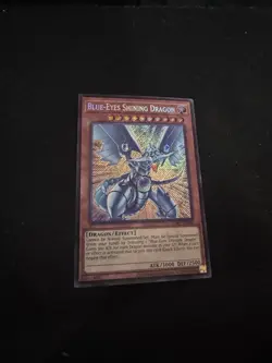 YUGIOH BLUE-EYES SHINING DRAGON LCKC-EN008 SECRET UNLIMITED ED NM - Image 1