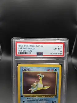 1999 POKEMON FOSSIL 1ST EDITION #10 LAPRAS-HOLO PSA 8 - Image 2