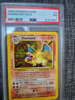 PSA 7 Charizard 4/102 Base Set Rare Holo Pokemon Card 1999 WOTC - Near Mint - Image 1