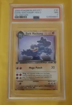 Pokemon 1st Edition Team Rocket Dark Machamp Holo PSA 7 - Image 1