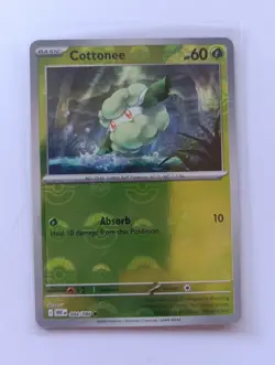 Pokemon TCG - Cottonee 004/086 Poke Ball Holo S&V White Flare Card - Image 1