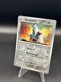 Pokemon - Prismatic Evolutions 069/131 - Duraludon - Reverse Holo - Image 1