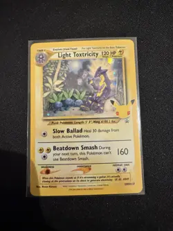 Pokemon TCG Light Toxtricity Black Star Promo SWSH137 Holo Card NM Condition - Image 1