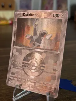 Duraludon Poke Ball Pattern 69/131 Prismatic Evolutions Holo Pokemon Card - Image 2