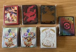 Lot of 7 Pokemon Card Deck Sleeves From Elite Trainer Boxes Charizard UPC Sealed - Image 1