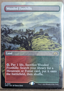 Magic The Gathering: Wooded Foothills (Borderless) Modern Horizons 3 - Image 1