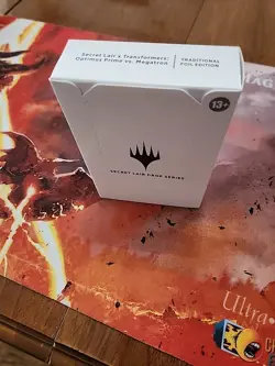 MTG Secret Lair Transformers: Optimus Prime Vs Megatron FOIL SEALED - Image 1