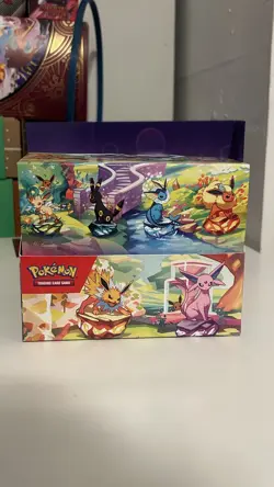 Pokemon TCG Prismatic Evolutions Set Of 8 Sealed Mini Tins W Open Display Box - Image 2