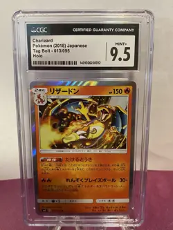 CGC 9.5 Charizard 013/095 Tag Bolt Holo Japanese Sun & Moon Tcg Graded Card - Image 1